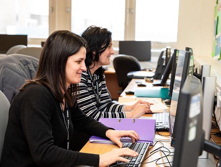 Students working on computers