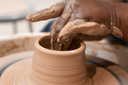 pot being turned on a wheel